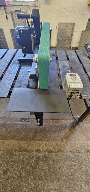 Variable speed controller next to 72in belt grinder